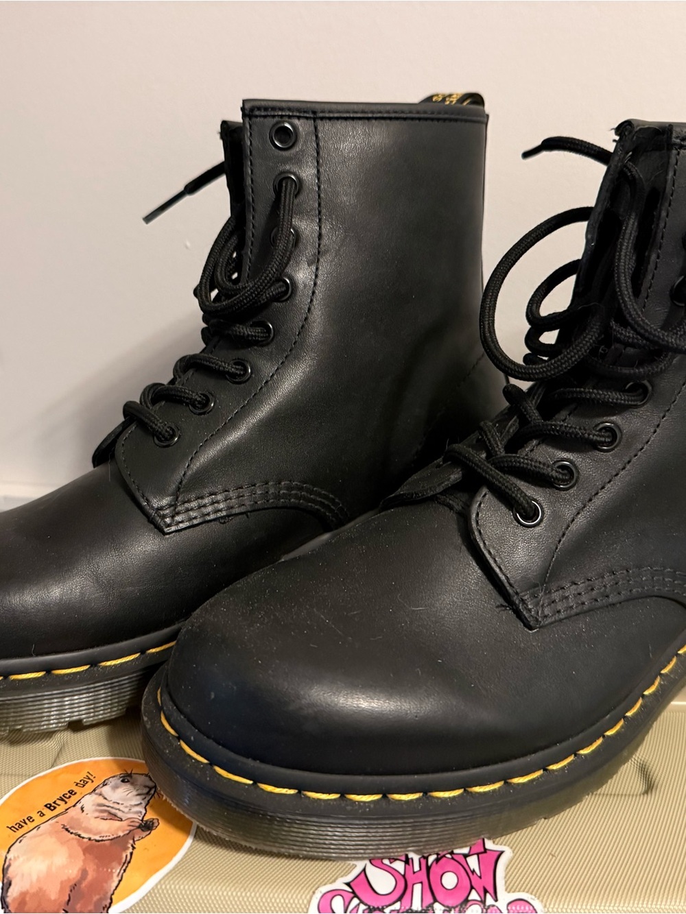 Dr. Martens Black Leather Lace-Up Boots with Yellow Stitching Detail